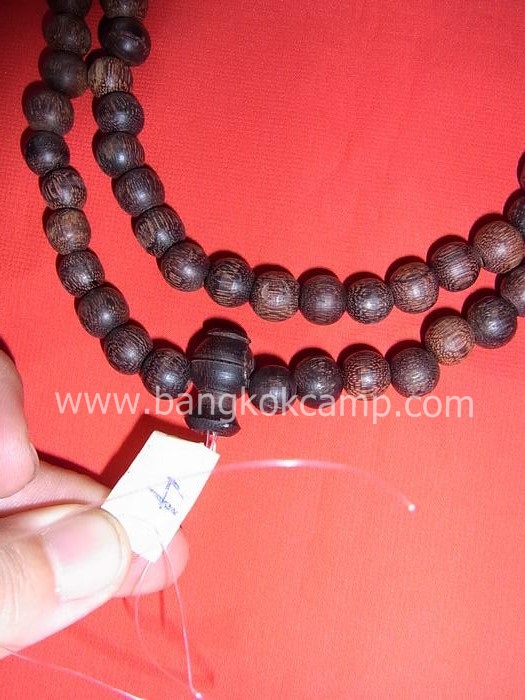 ไม้มงคลหายาก... ประคำ(ไม้แก่นมะขาม) ลายสวย ขนาด10มิล.ยาว18.5นิ้ว..ไม้แก่นมะขามแท้ทุกเม็ด (CN011)