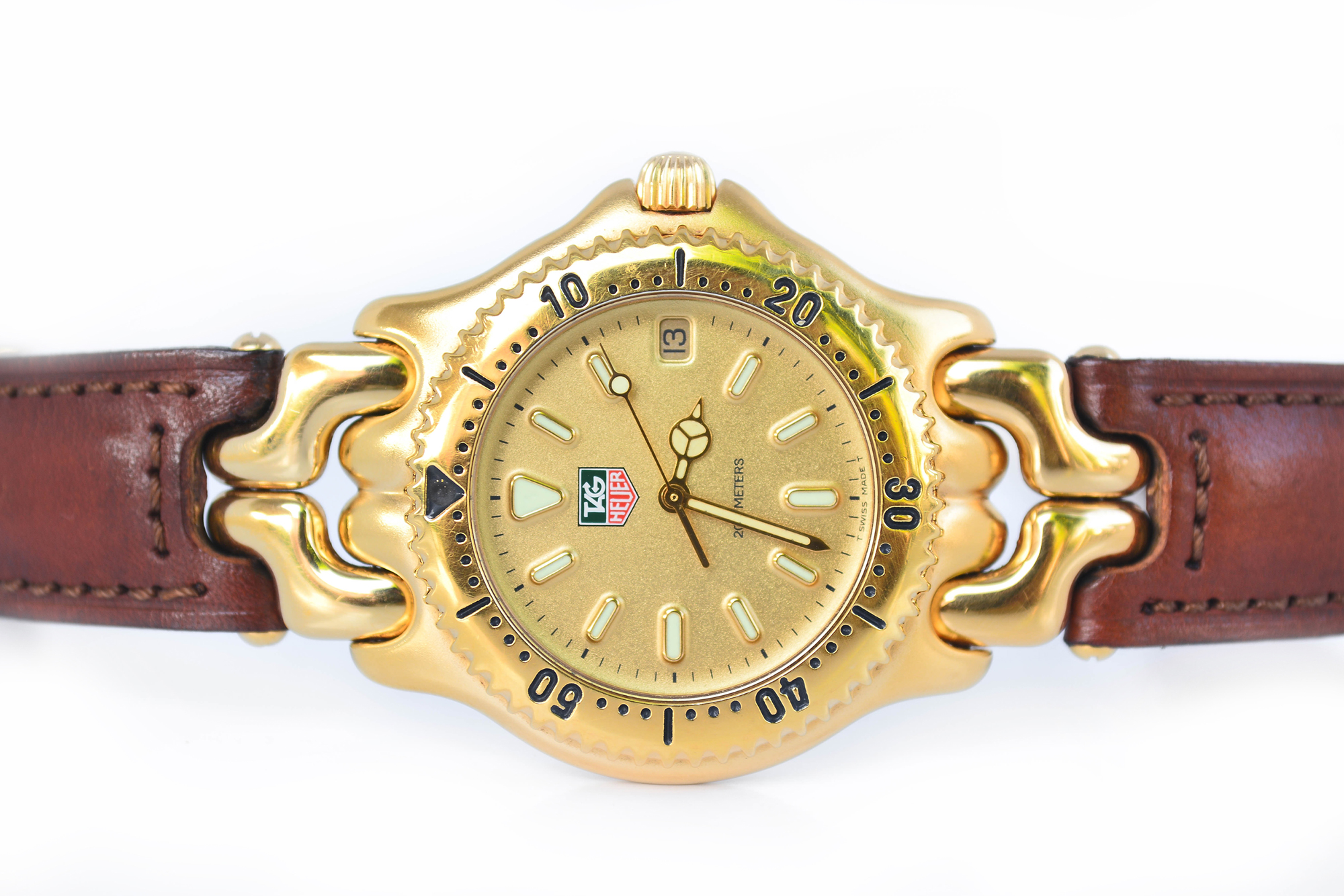 Tag Heuer ก้างปลา King Size Quartz เรือนทอง หน้าทรายทอง สายหนัง