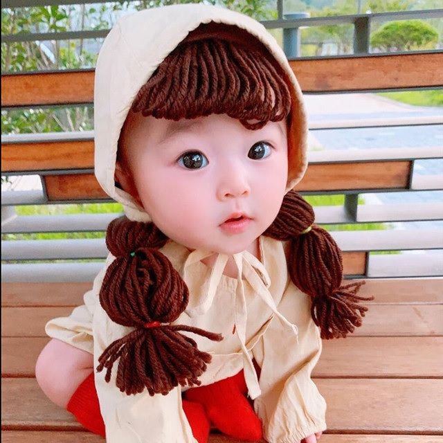 หมวกสาวน้อยสีครีม ผูกใต้คาง แต่งเปีย