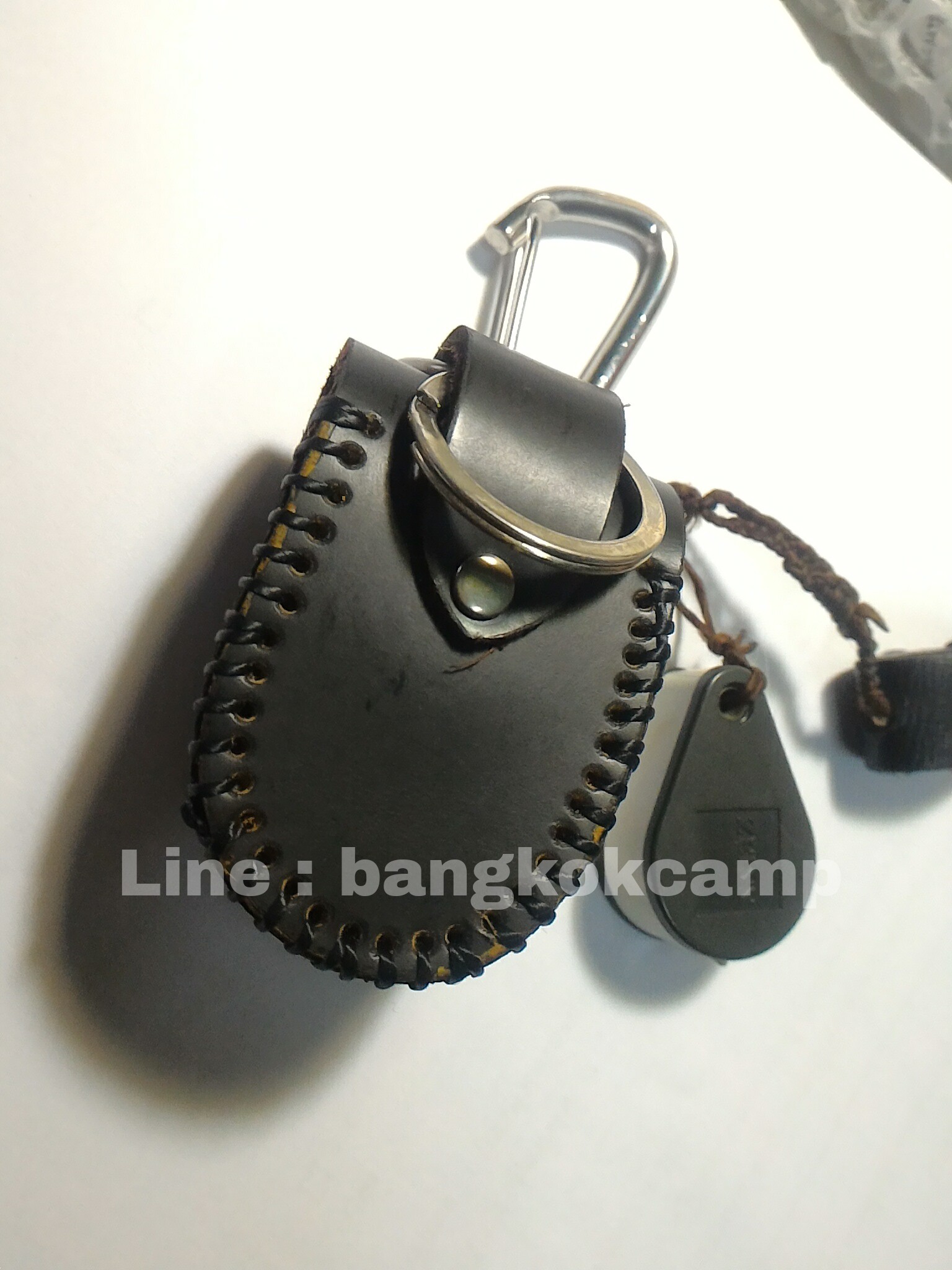 ซองหนังแท้ เย็บมือ ใส่กล้องส่องพระ + พวงกุญแจสแตนเลสแท้