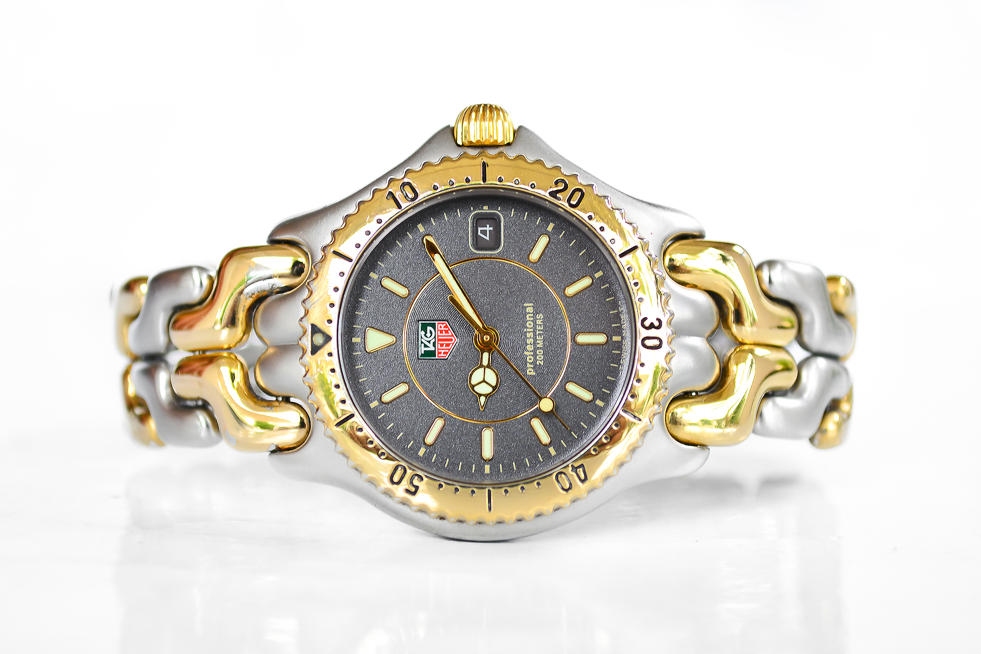 Tag Heuer ก้างปลา 2 กษัตริย์ หน้าเทาวงแหวน 2 ชั้น boy size (Sold)