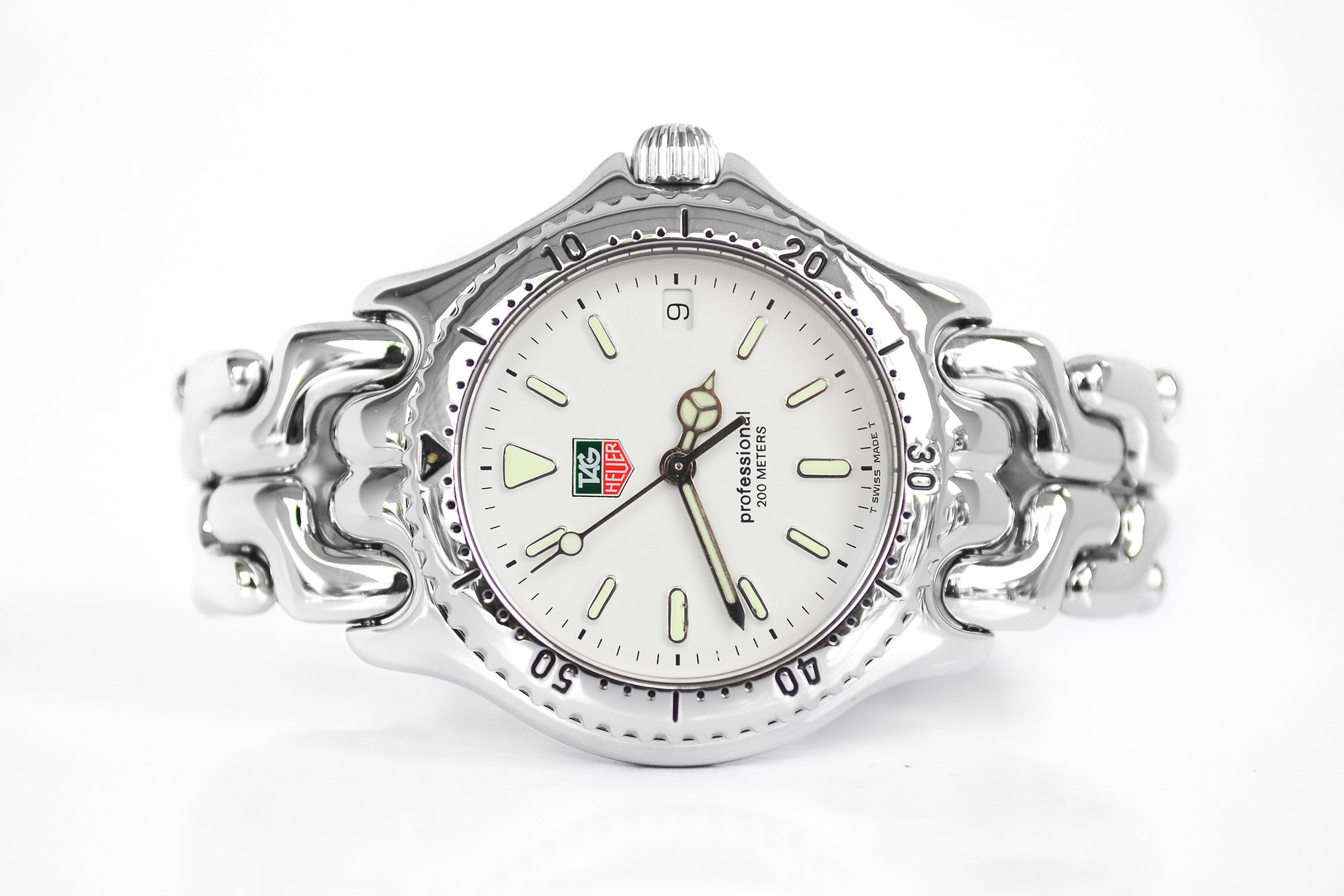 Tag Heuer ก้างปลา Boy size Quartz หน้าขาว (Sold)