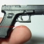 พวงกุญแจ ยี่ห้อปืน กล๊อก Glock รุ่น2 (Gen4) วัสดุโพลีเมอร์(วัสดุเดียว กับที่ทำปืน GLOCK) ....Made in Austria ....ใหม่ แท้